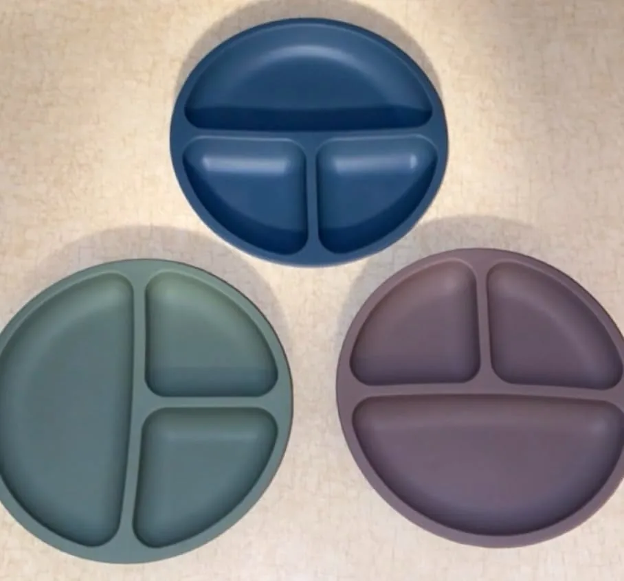 Round divided silicone suction plates in blue, green and brown