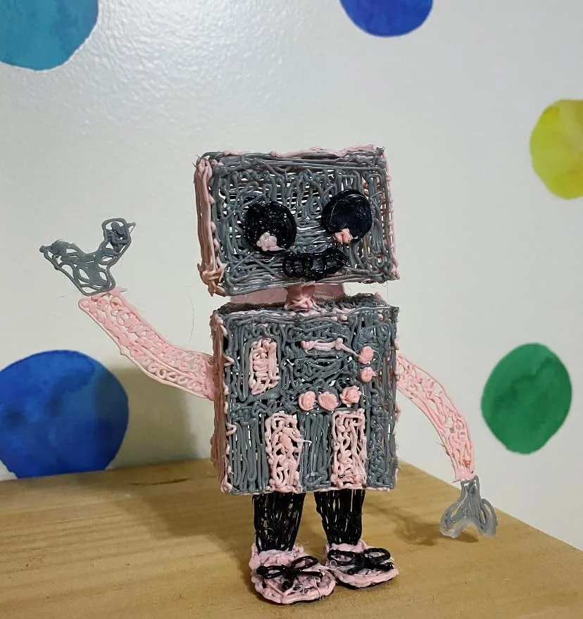 Standing robot figure drawn in the air with a 3Doodler pen