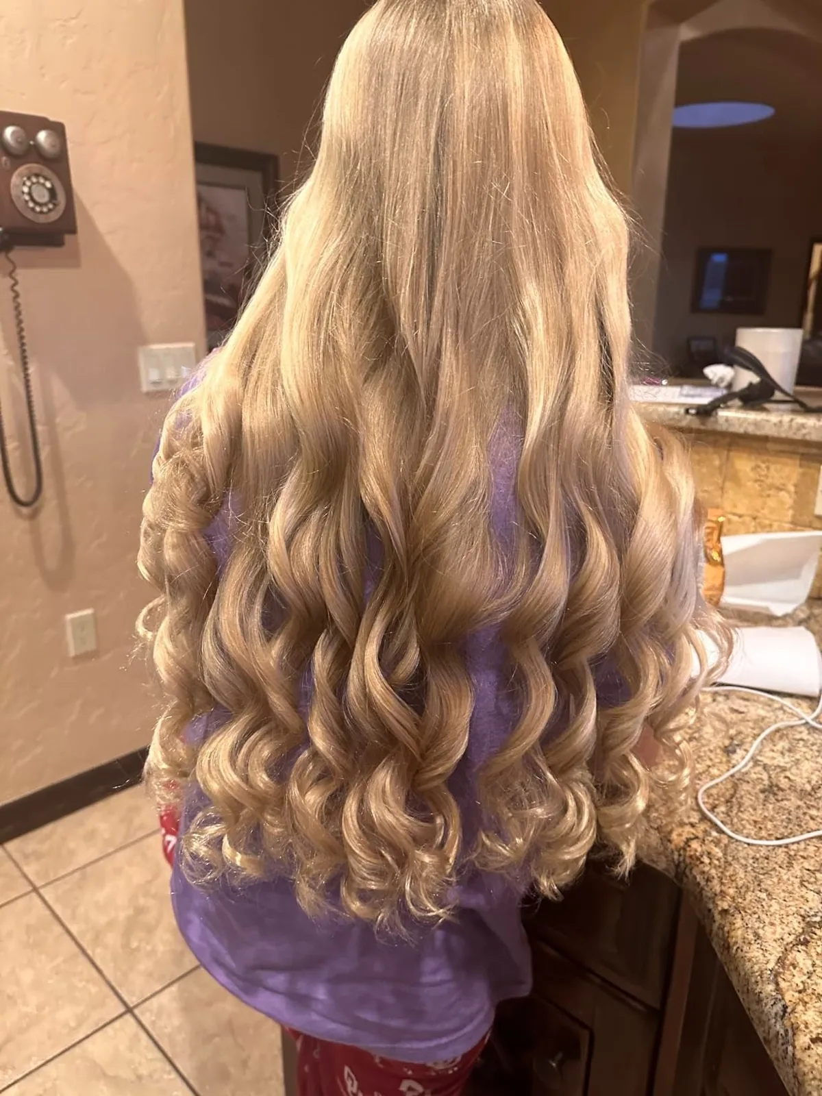Long hair in loose waves after an overnight satin heatless curl set