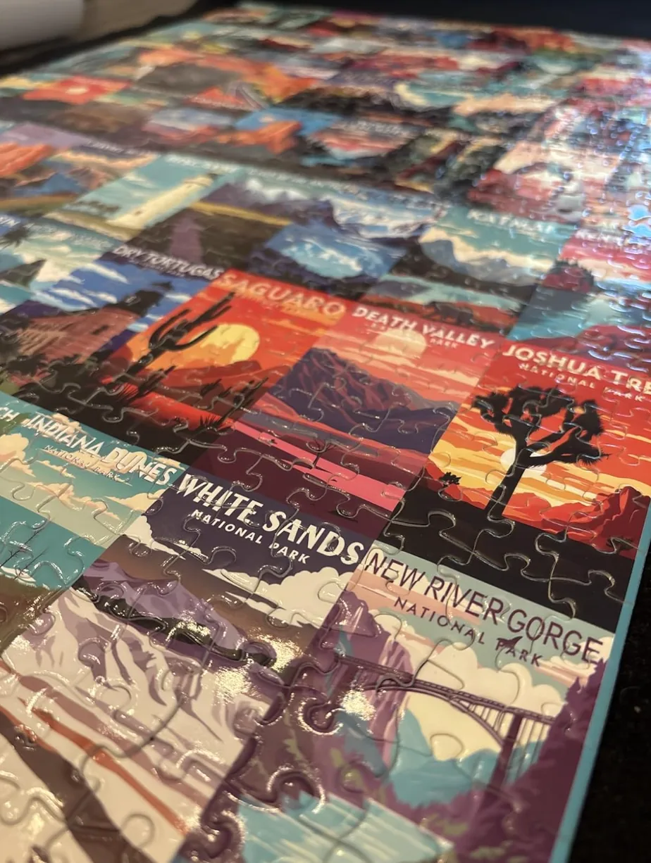 Completed jigsaw puzzle made of illustrated national park posters
