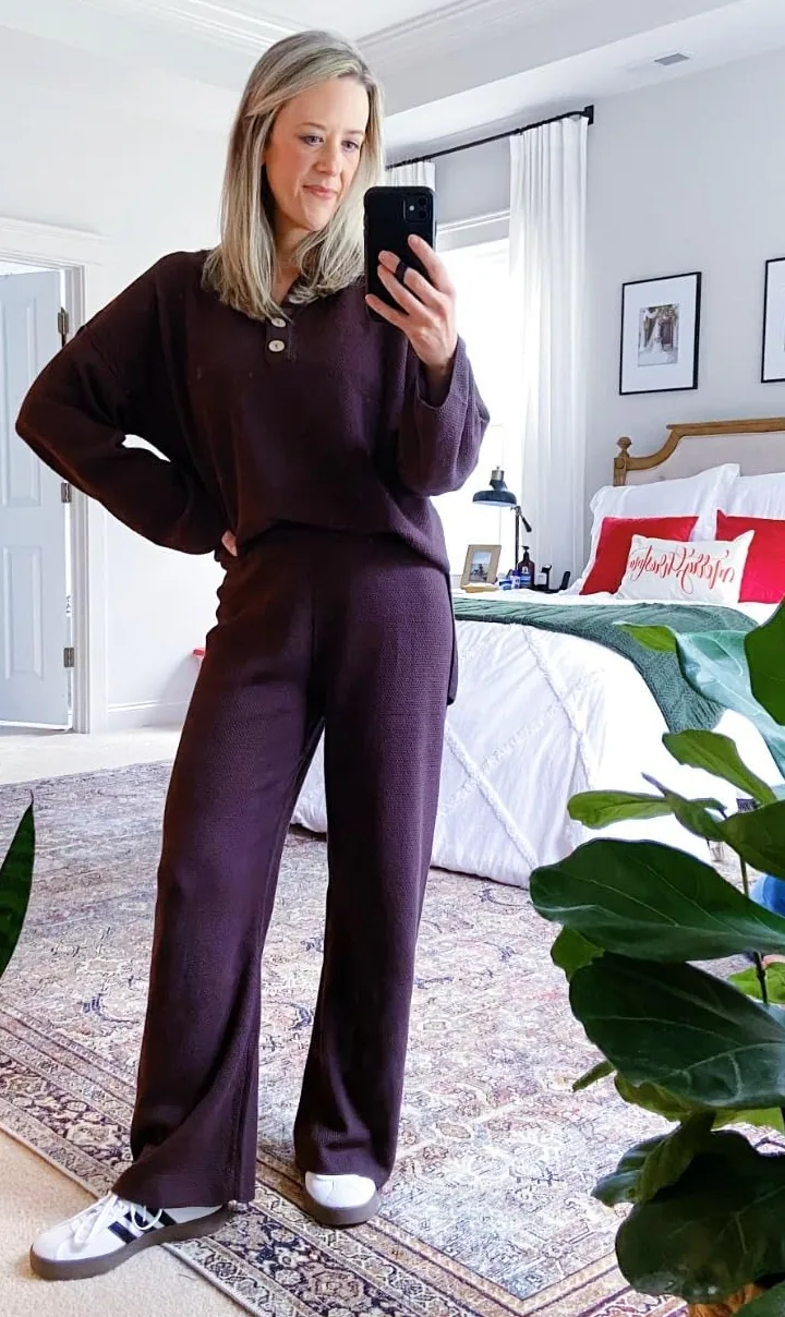 Oversized knit sweater and matching pants lounge set in a bedroom mirror