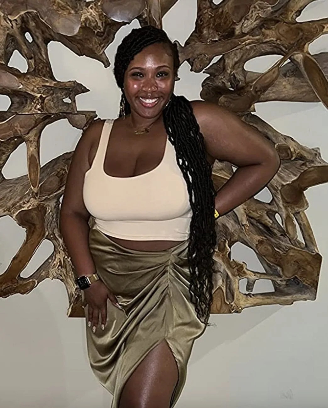 Cream square-neck seamless cropped tank styled with a satin skirt