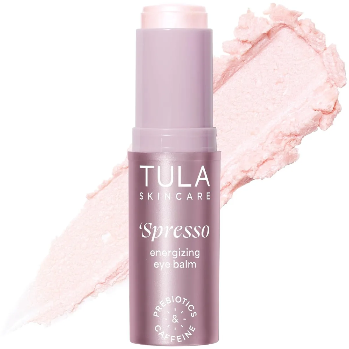 TULA Spresso energizing eye balm stick with a pink swatch
