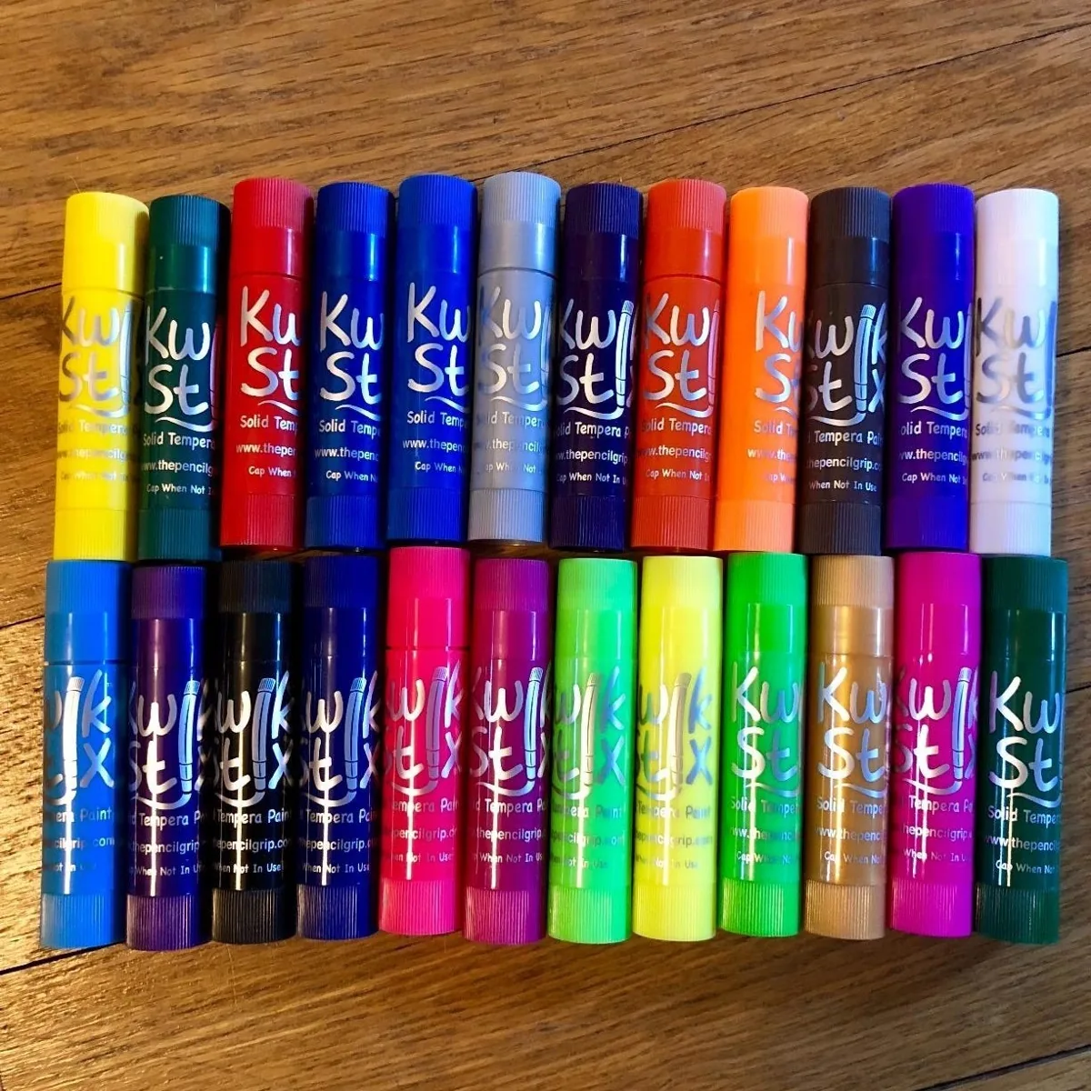 Set of colorful tempera paint sticks