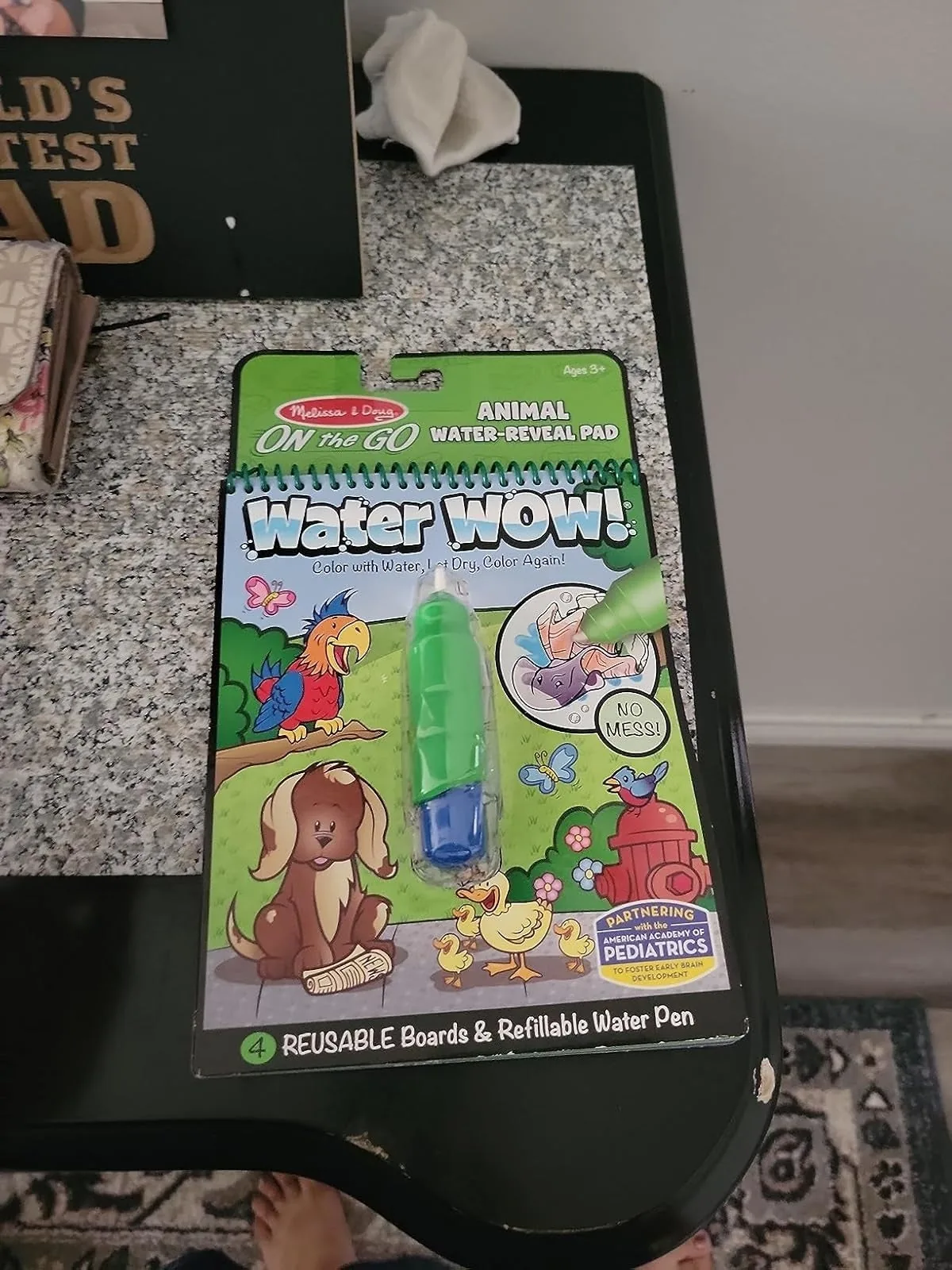 Water Wow animal water-reveal coloring pad with a refillable water pen
