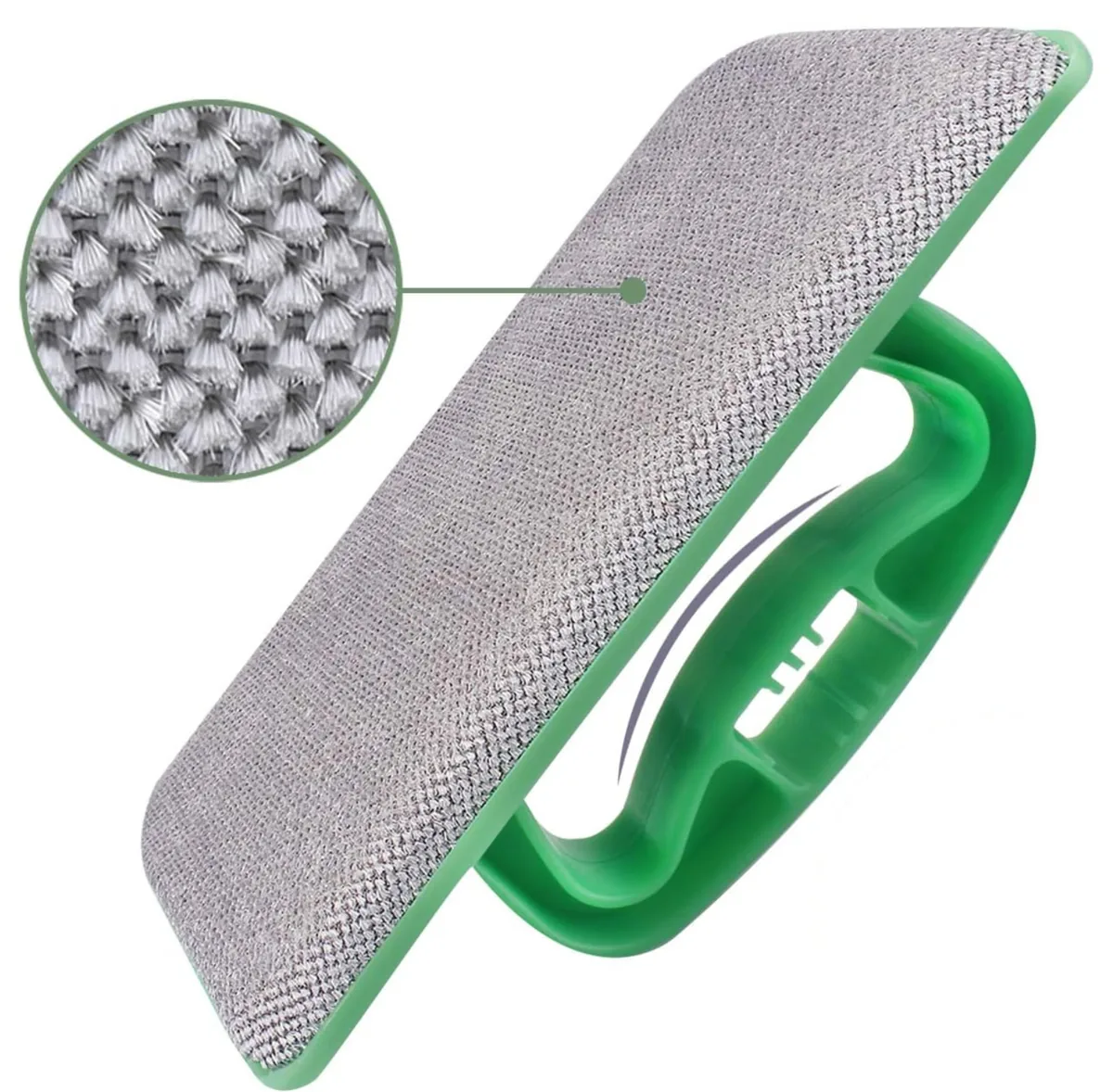 Window screen cleaning brush with a green handle and fine mesh pad